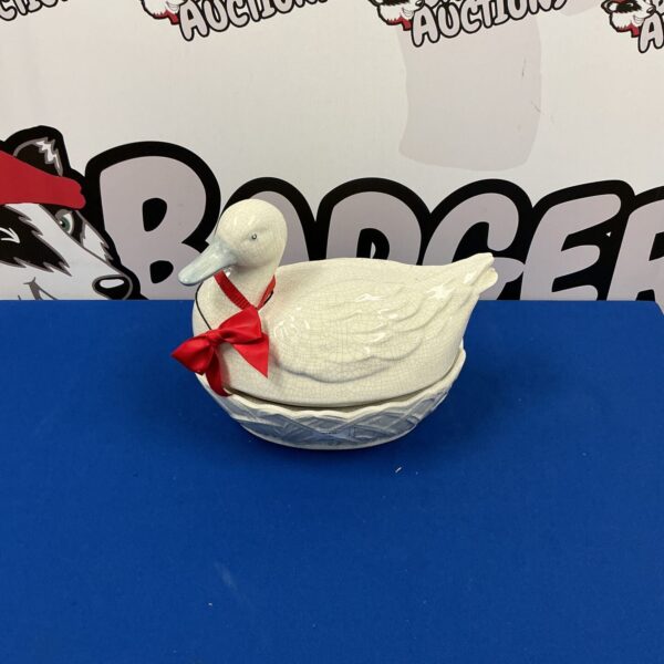 Vintage porcelain chicken egg holder for farmhouse kitchen decor.