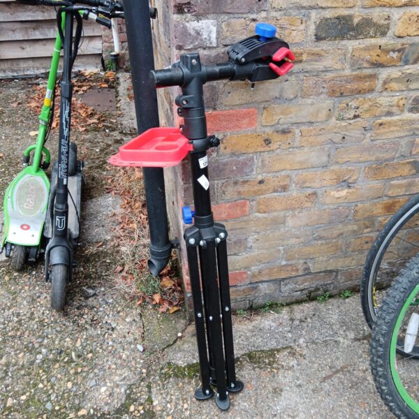 Portable bike repair stand for bicycle maintenance and repairs.