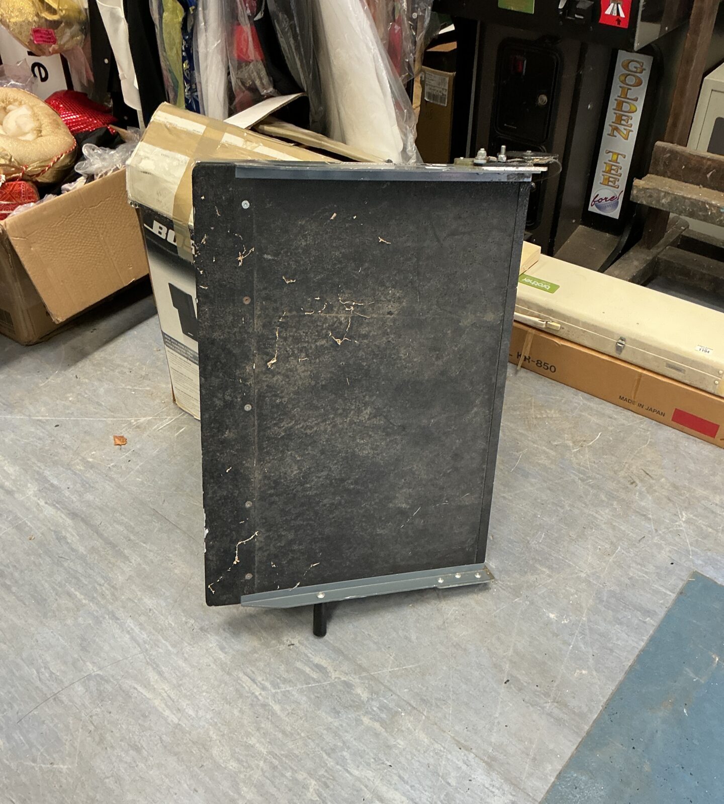 Portable mobility ramp for wheelchair access, showing metal construction.