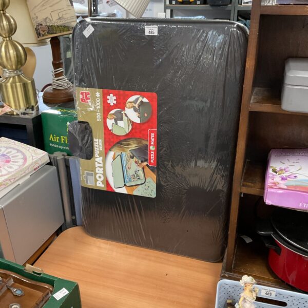 Vintage Portapuzzle Deluxe board for jigsaw puzzles.