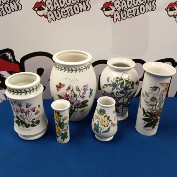 Set of six Portmeirion Botanical Gardens vases with floral designs.
