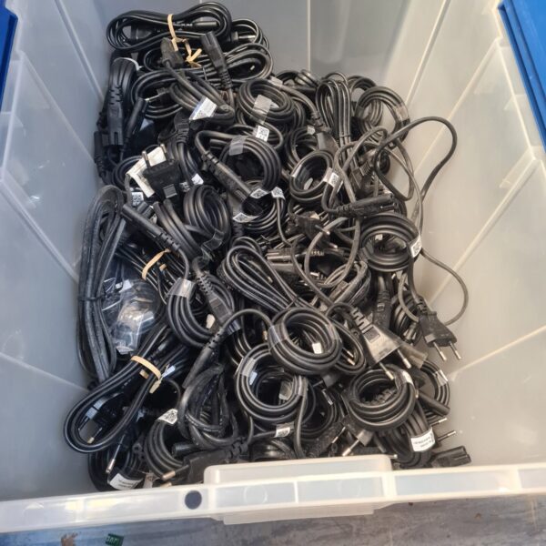 Crate full of mixed power cables and IEC leads.