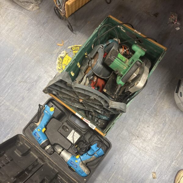 Open carrying case with assorted power tools inside.