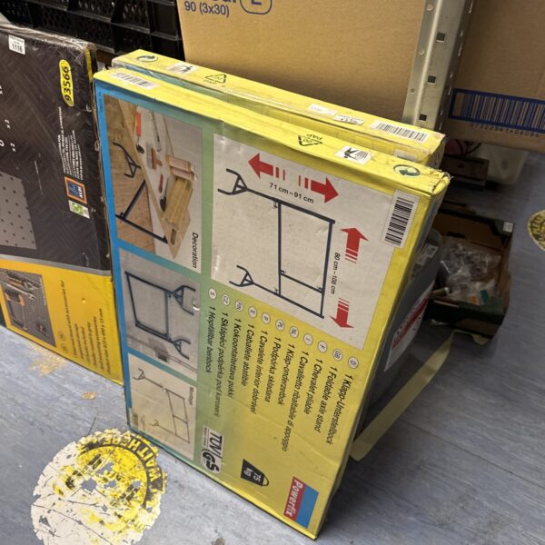 Two Powerfix folding clothes stands stacked together for storage.