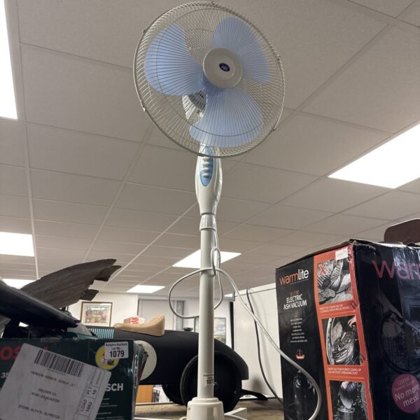 Vintage Prem-I-air pedestal fan for cooling and retro style.