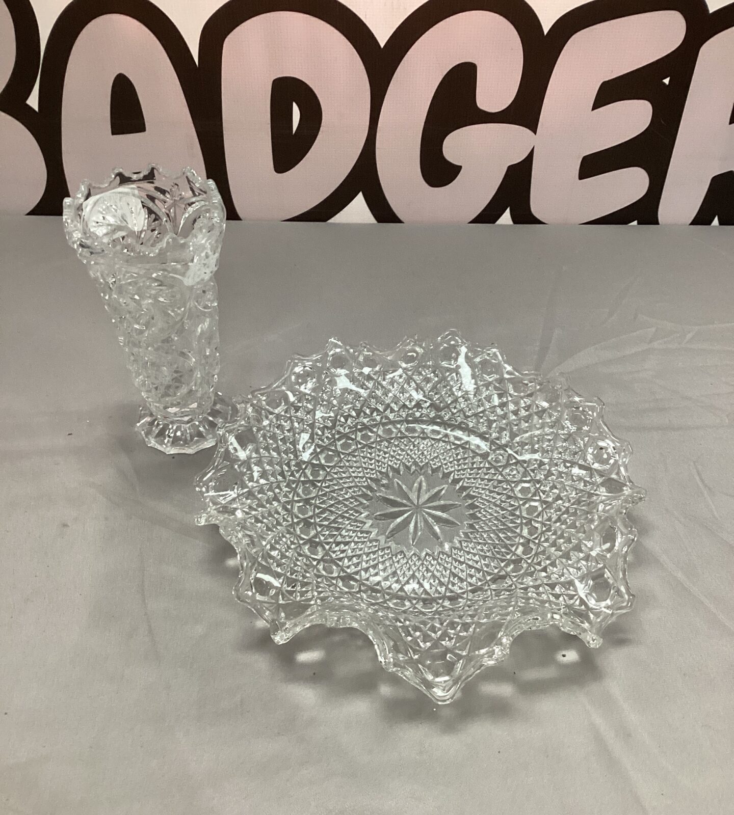 Vintage pressed glass bonbon dish with floral design.