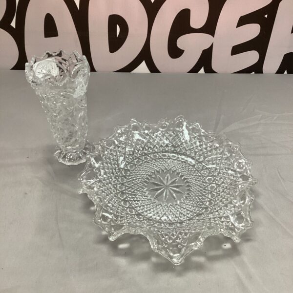 Vintage pressed glass bonbon dish with floral design.