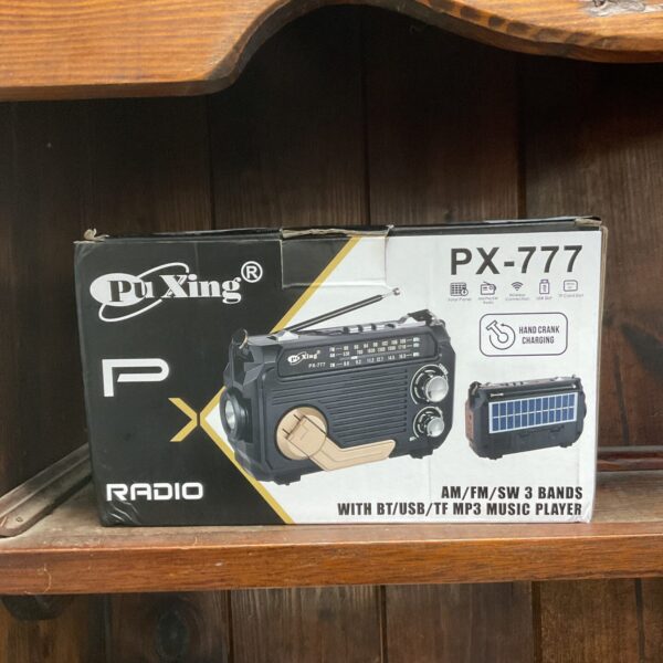 Pu Xing PX-777 hand crank radio, a portable emergency radio for AM FM SW broadcasts.