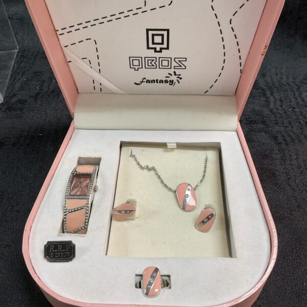 Vibrant vintage Qbos fantasy jewellery set with orange lucite.
