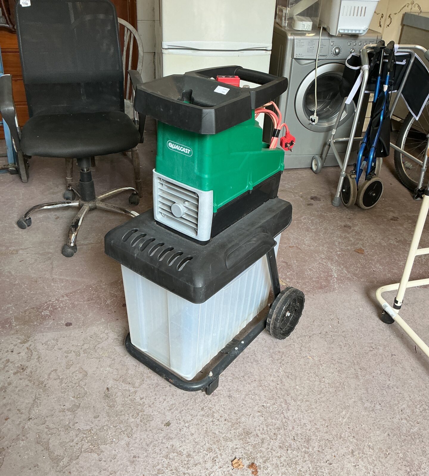 Qualcast electric garden shredder on wheels for garden waste disposal.