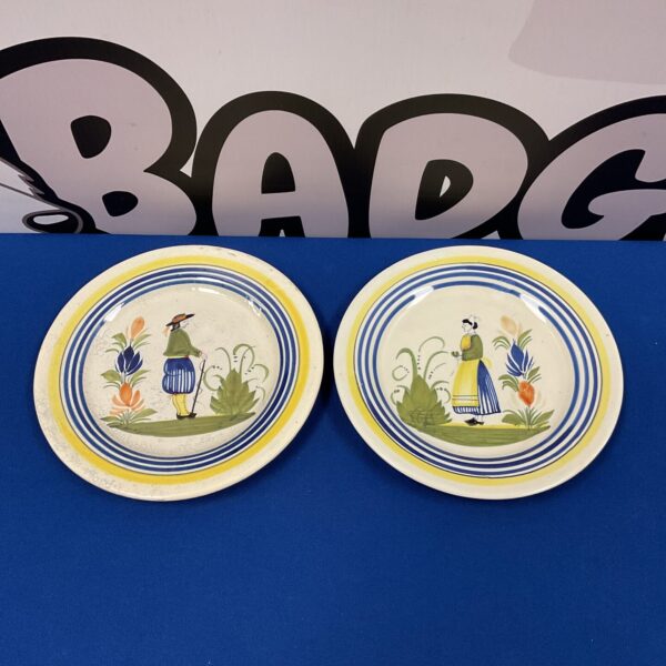 Vintage Quimper plate depicting a man in traditional Breton attire.