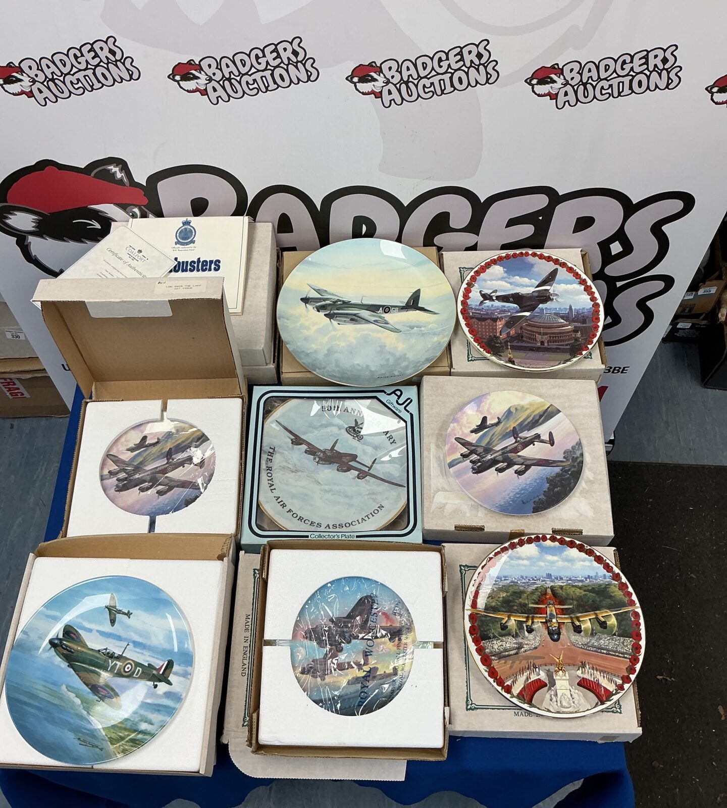 Vintage RAF commemorative plates depicting World War Two aircraft.