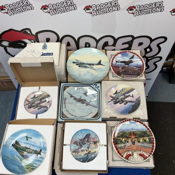 Vintage RAF commemorative plates depicting World War Two aircraft.