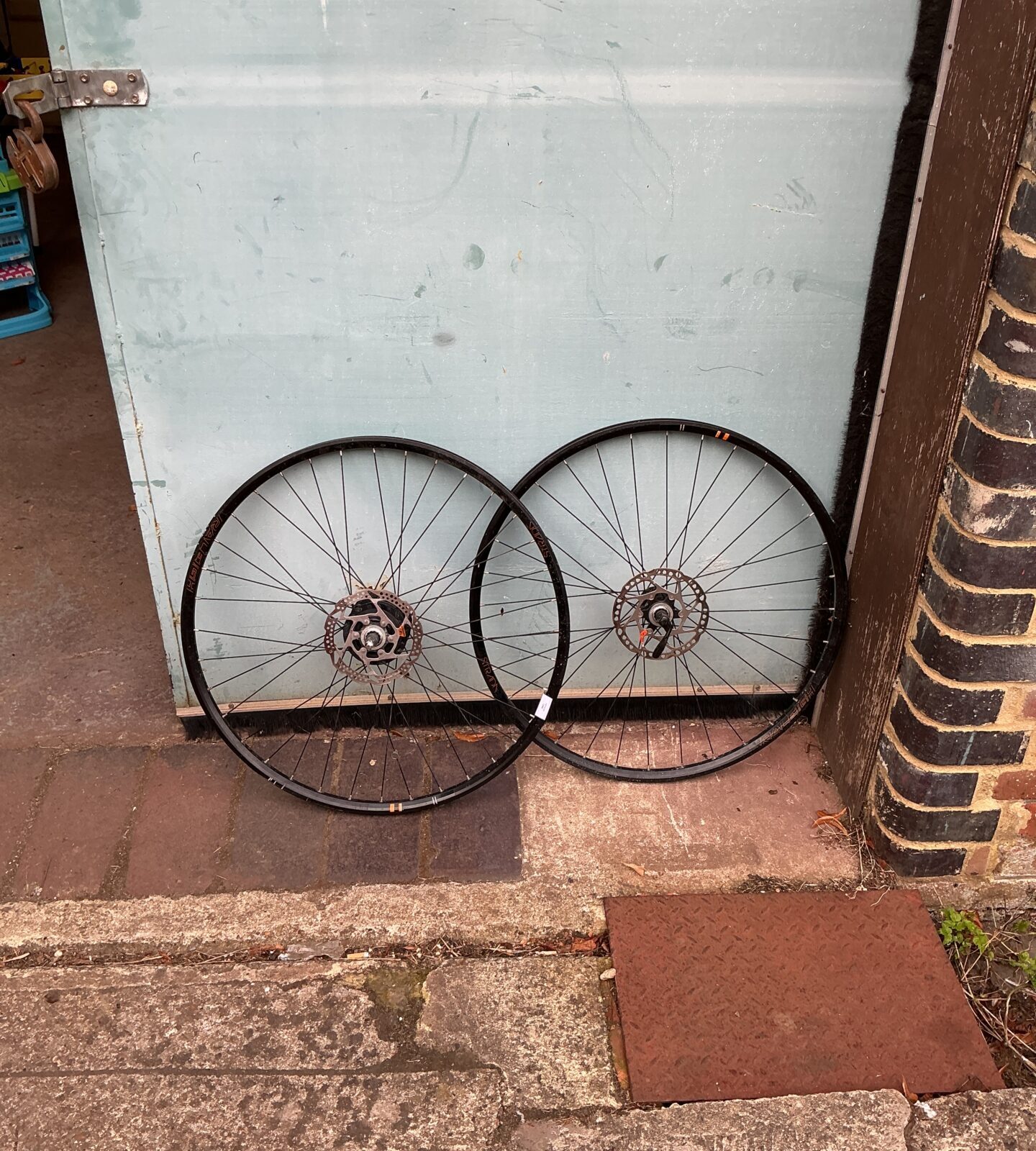 Pair of used Raleigh bike wheels for bicycle restoration.