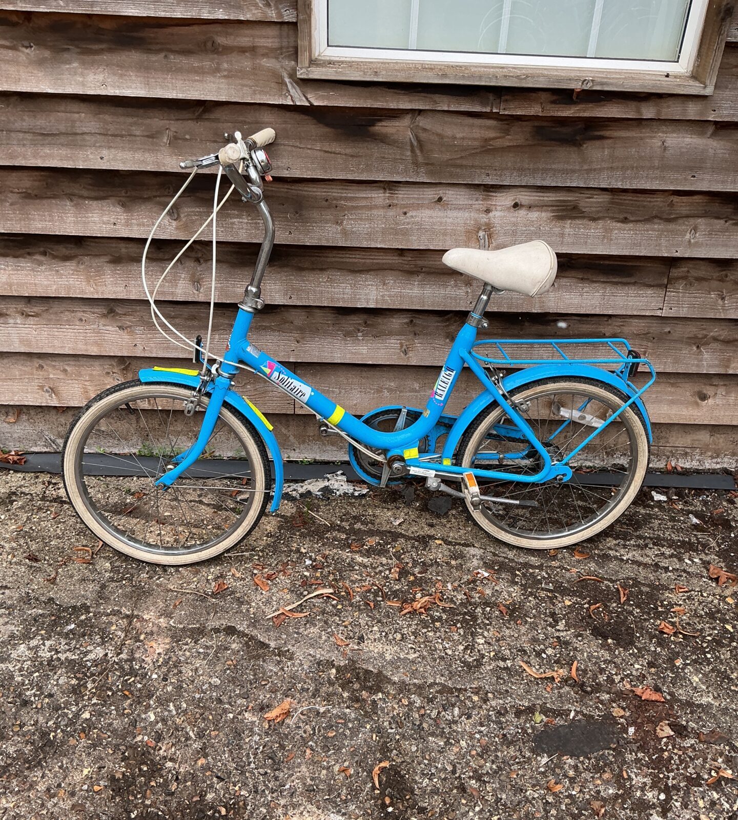 Blue vintage Raleigh Solitaire folding bicycle in good condition.
