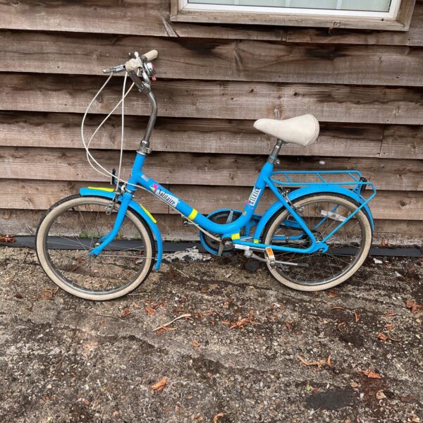 Blue vintage Raleigh Solitaire folding bicycle in good condition.