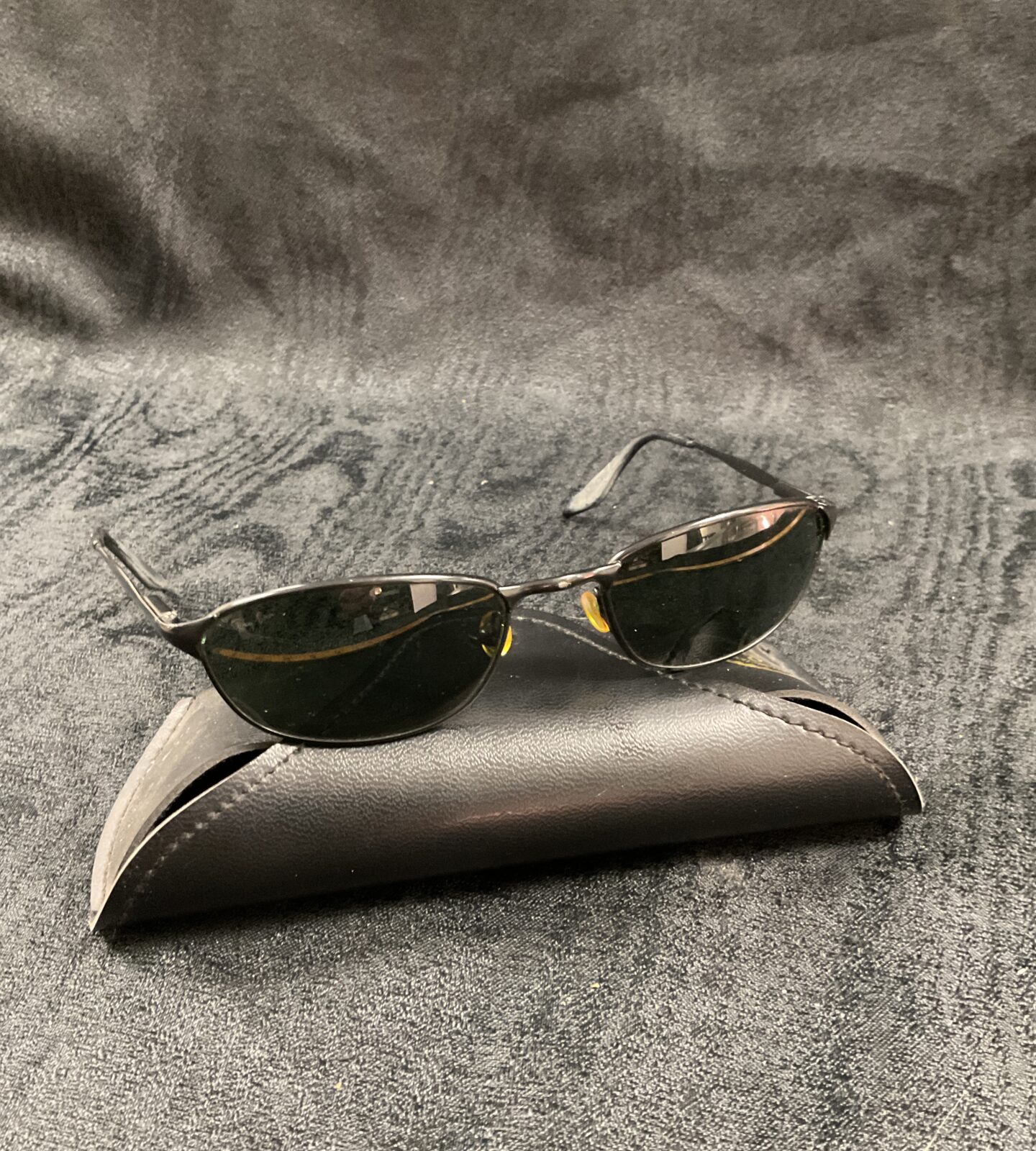 Silver framed vintage Ray Ban sunglasses with case.