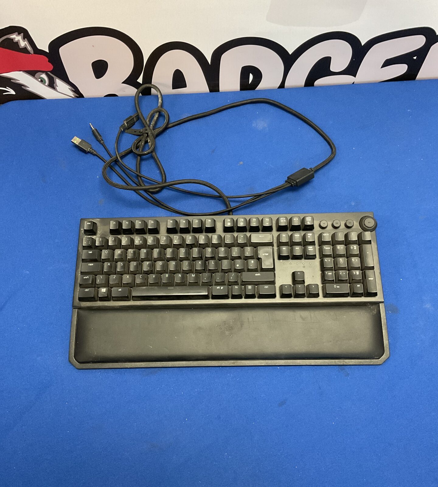 Razer BlackWidow Elite mechanical gaming keyboard with wrist rest.