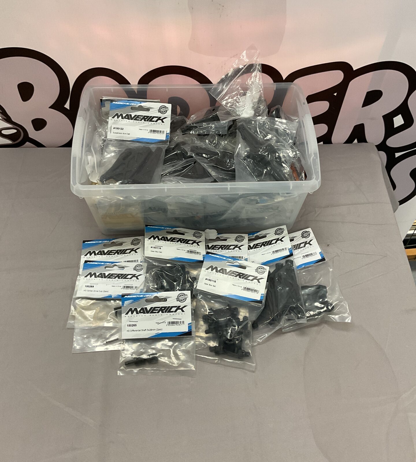 RC car parts and accessories lot including Maverick brand.