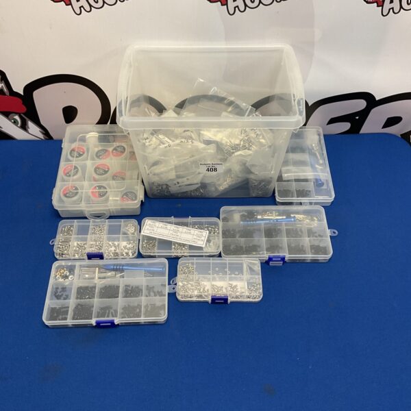 Mixed lot of RC car parts and accessories for repairs and upgrades.