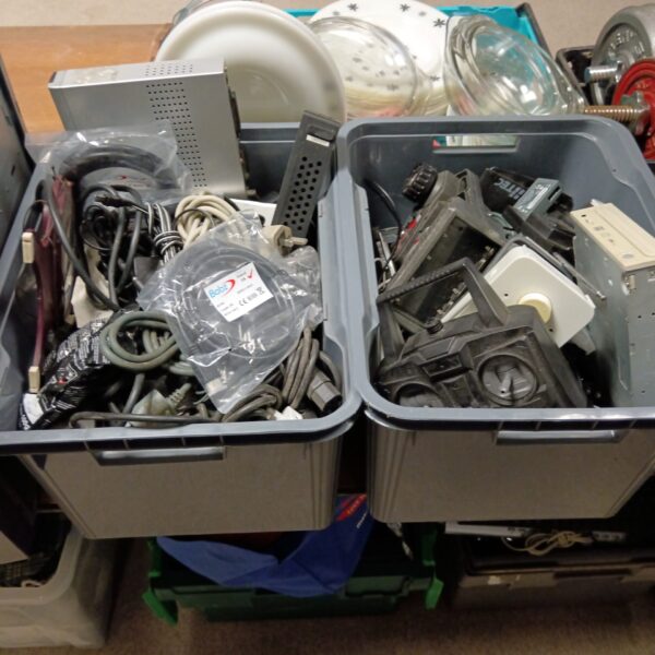 Mixed lot of RC controllers and cables for hobbyists.