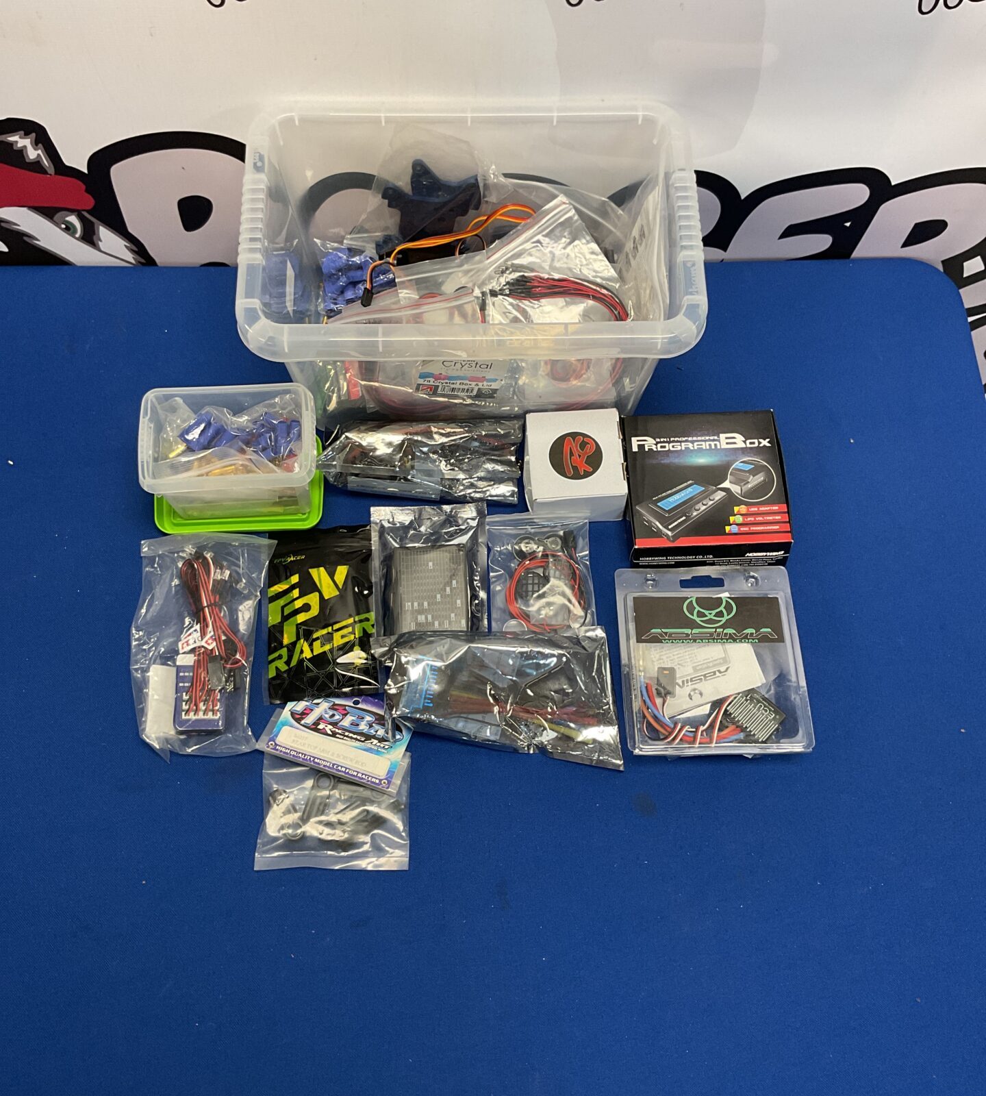 Mixed lot of RC model parts and spares for hobbyists.