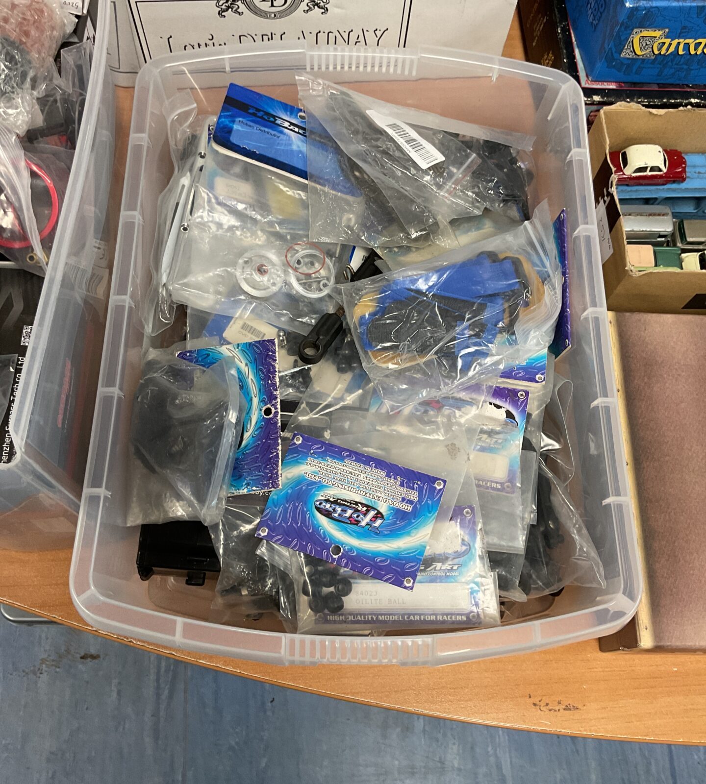 RC model parts lot including Ho Bao components for hobbyists.
