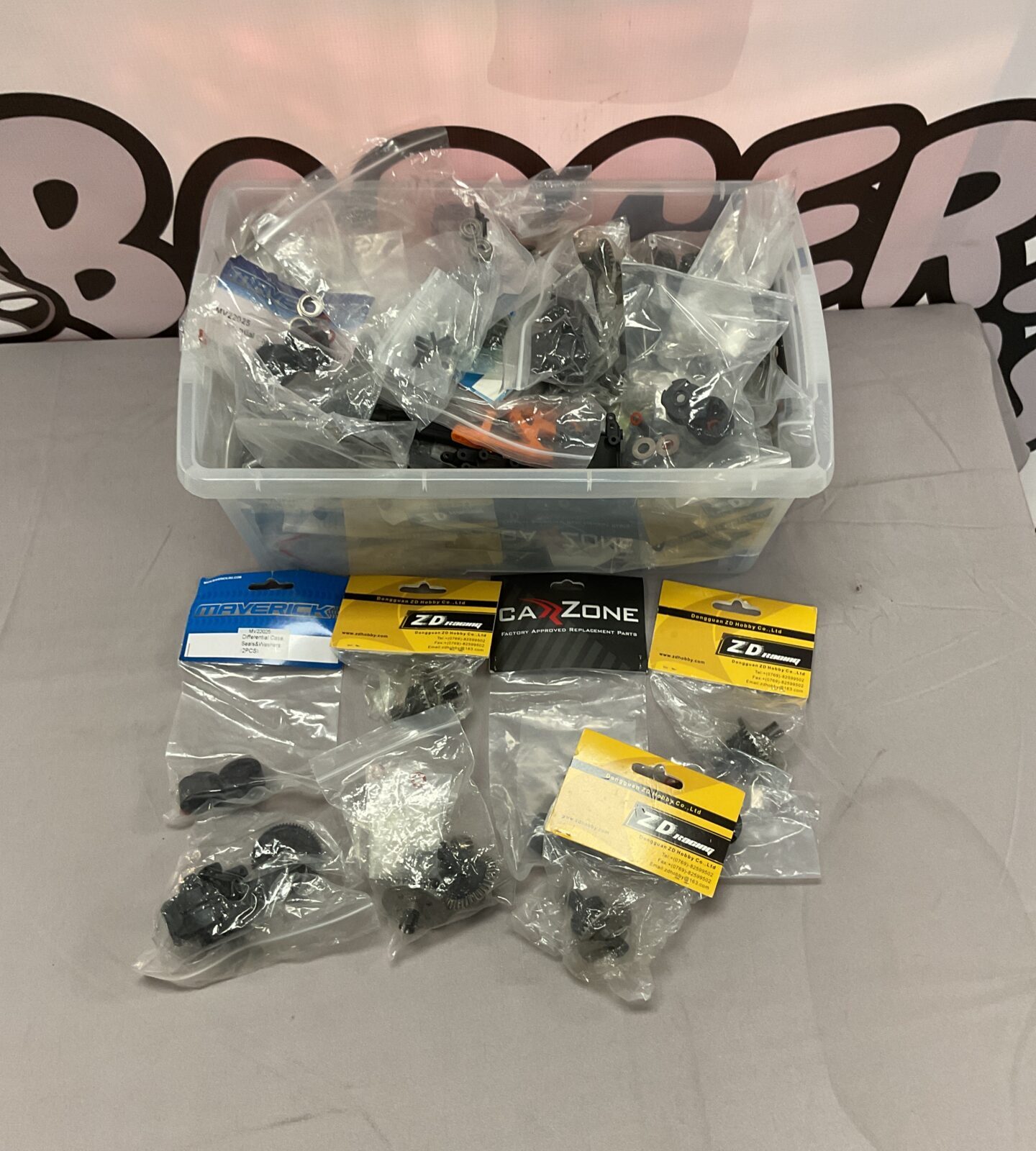 Mixed lot of RC model parts and accessories for hobbyists.