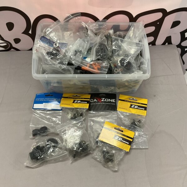 Mixed lot of RC model parts and accessories for hobbyists.