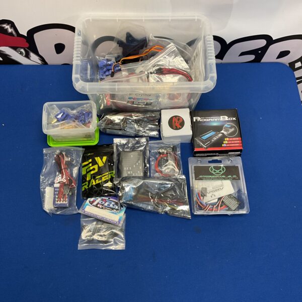 Mixed lot of RC model parts and spares for hobbyists.