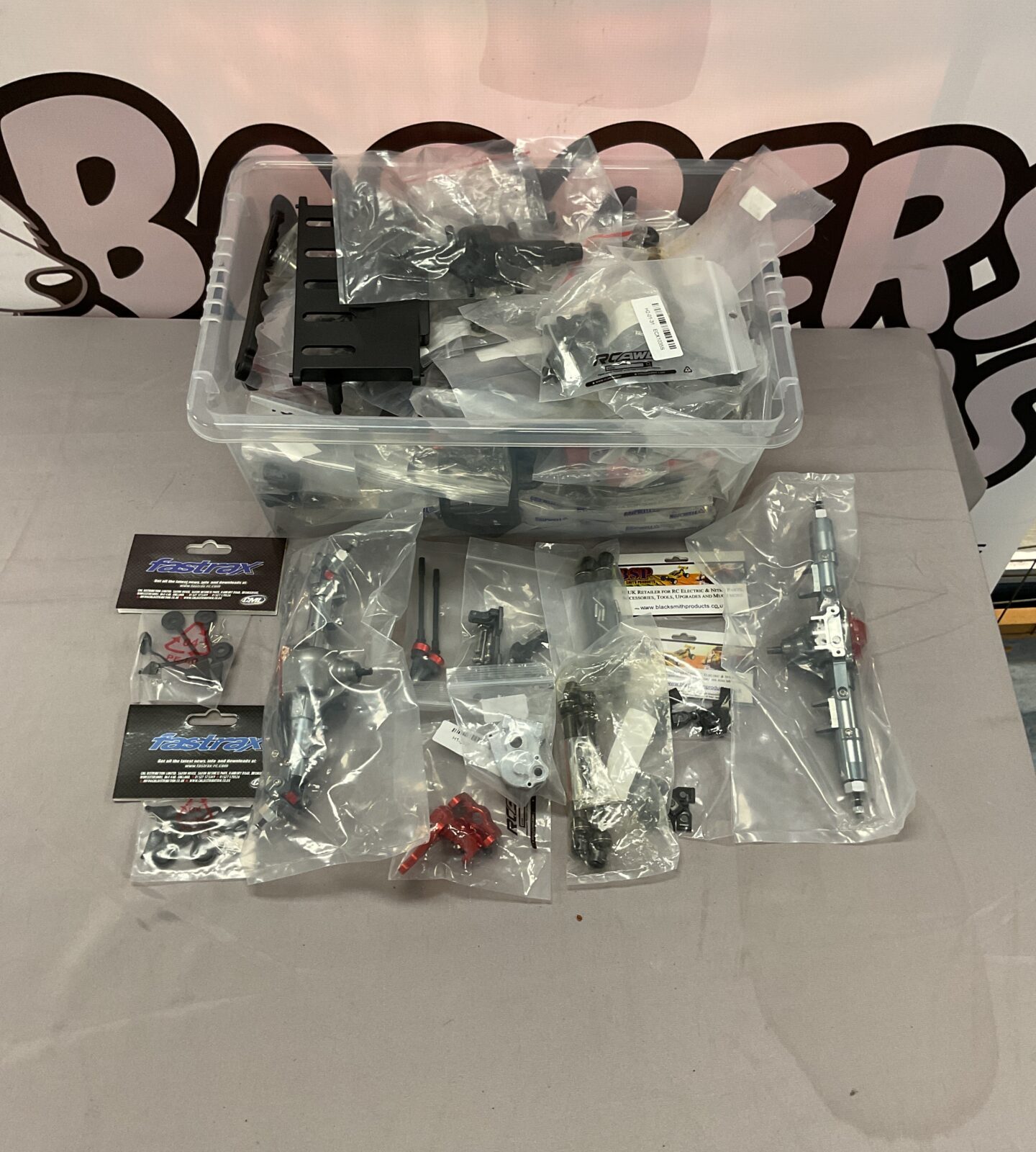 Assorted RC model parts and accessories for cars and airplanes.