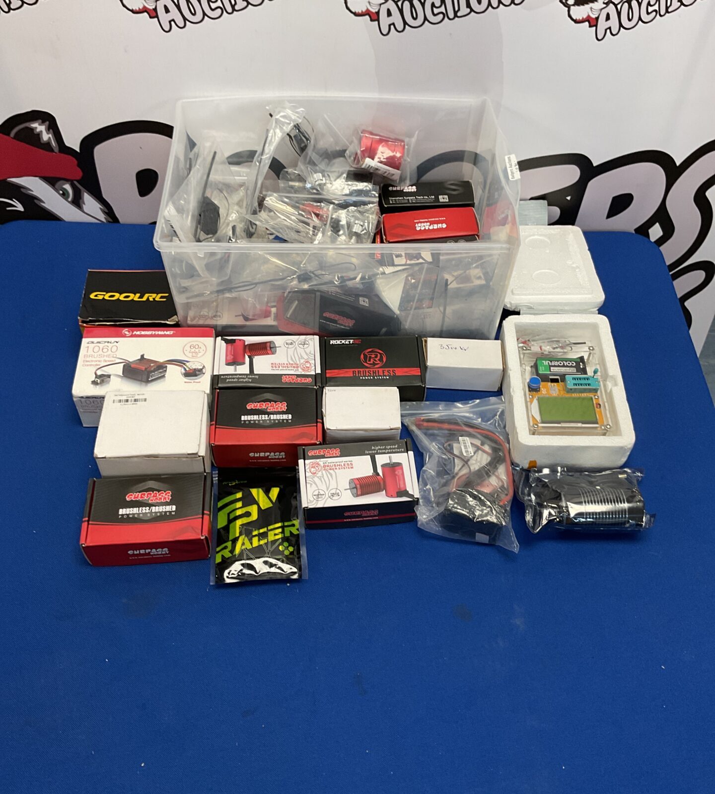 New RC model parts and accessories in original packaging.