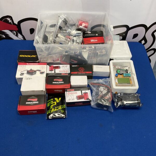 New RC model parts and accessories in original packaging.