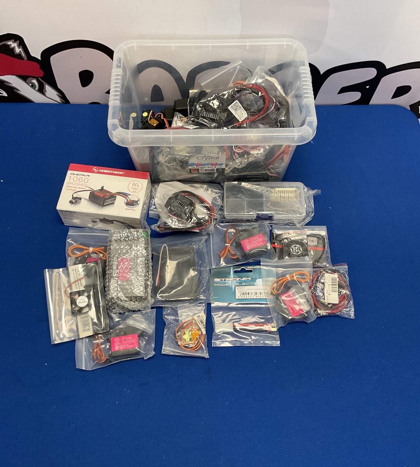 Mixed lot of RC parts and accessories including Hobbywing components.