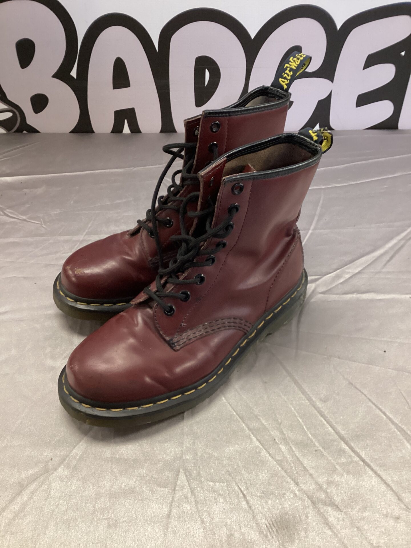 Vintage red Dr Martens boots size 4, classic leather footwear.