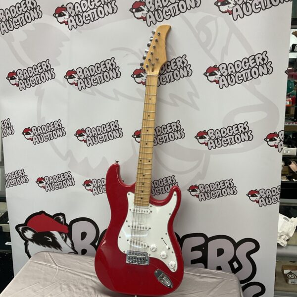 Vibrant red electric guitar with chrome hardware.