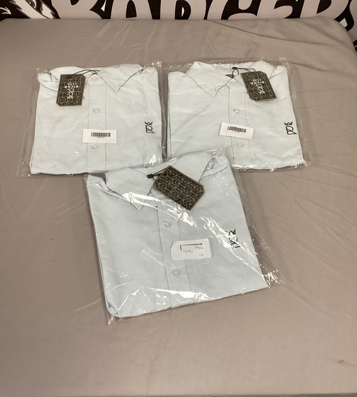 Three new Riche Luxe men's shirts presented in a lot.
