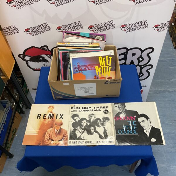 Collection of Rick and Pop 12” vinyl singles for collectors.