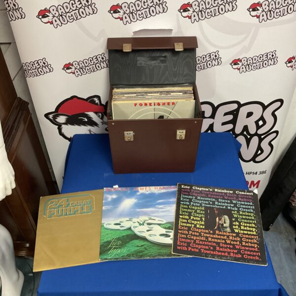 Vintage rock LP collection featuring Deep Purple and Eric Clapton vinyl records.