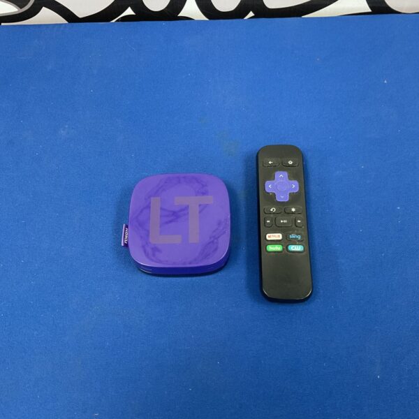 Vintage Roku LT 2400X streaming device with remote control.