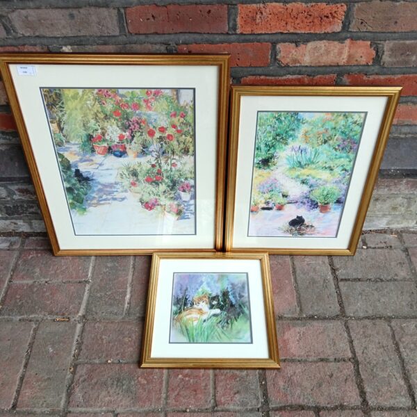 Romney Brough cat print depicting a cat in a vibrant garden.