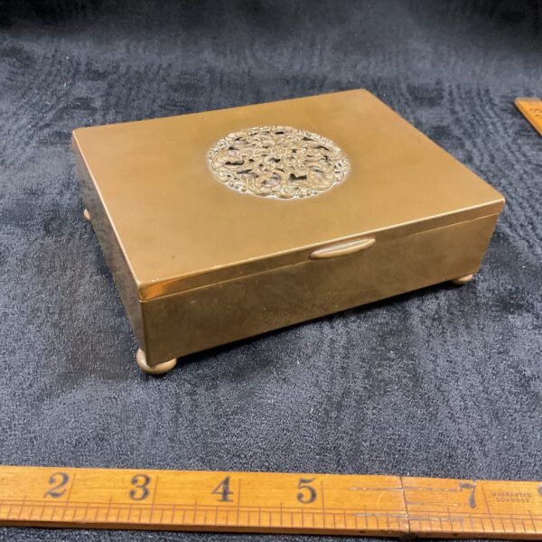 Vintage Rothmans Pall Mall brass cigarette box with engraved lid.