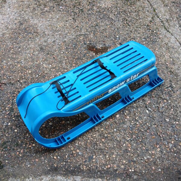 Blue Rotho Snow Star sledge for winter fun.
