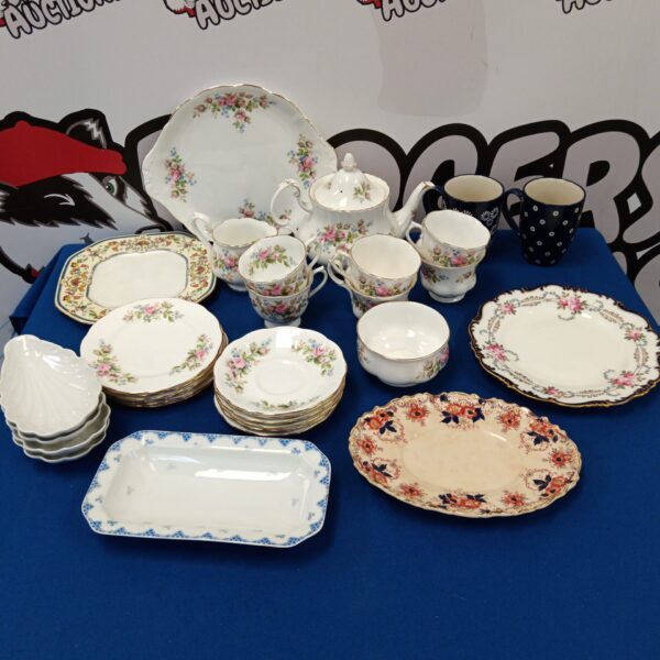Royal Albert Country Rose china set displayed on a table.
