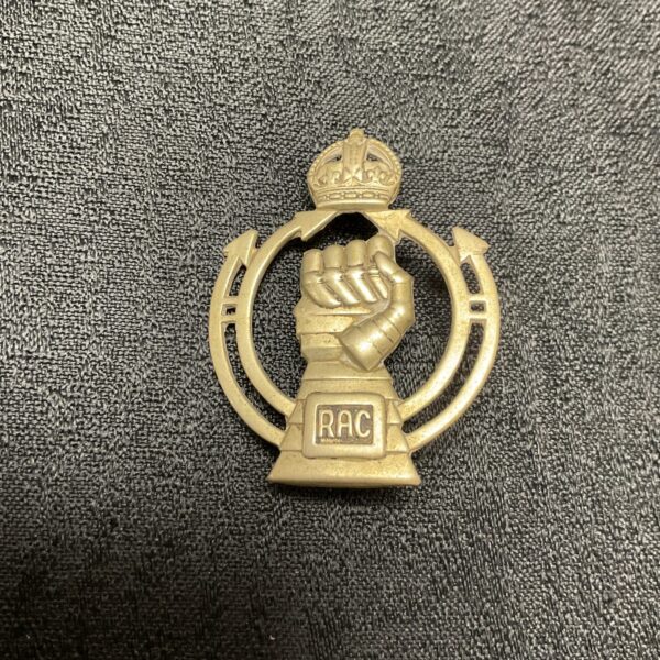 Front view of vintage Royal Armoured Corps cap badge.