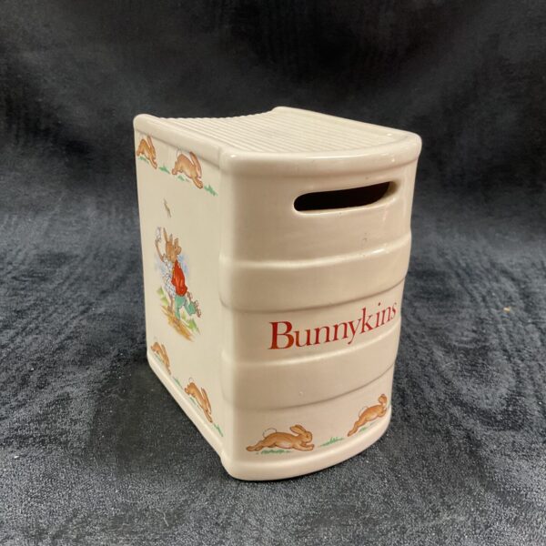 Front view of a vintage Royal Doulton Bunnykins money box.