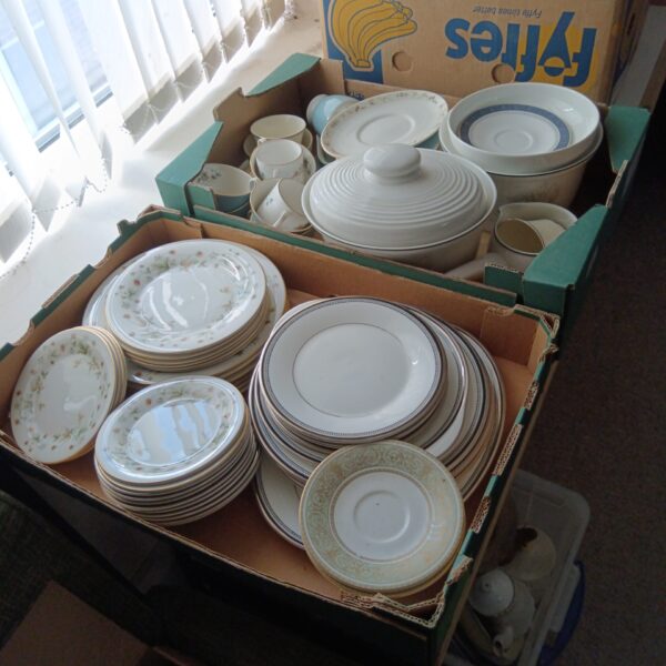Vintage Royal Doulton china set with floral pattern displayed in a box.