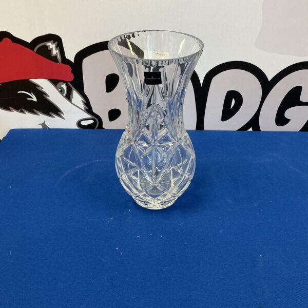 Elegant Royal Doulton crystal vase with intricate cut glass detailing.