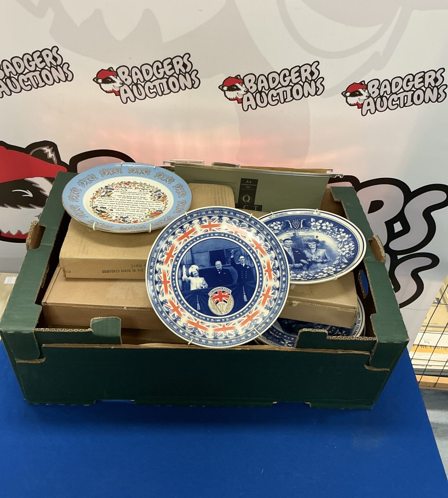 Collection of Royal Family commemorative collectible plates.