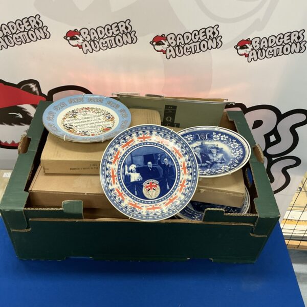 Collection of Royal Family commemorative collectible plates.